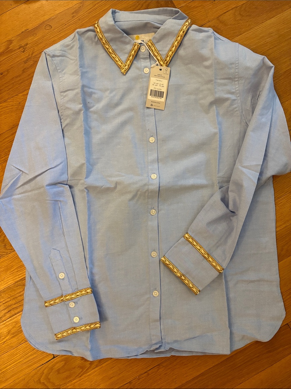 Light Blue Button-Up Shirt with Gold Trim